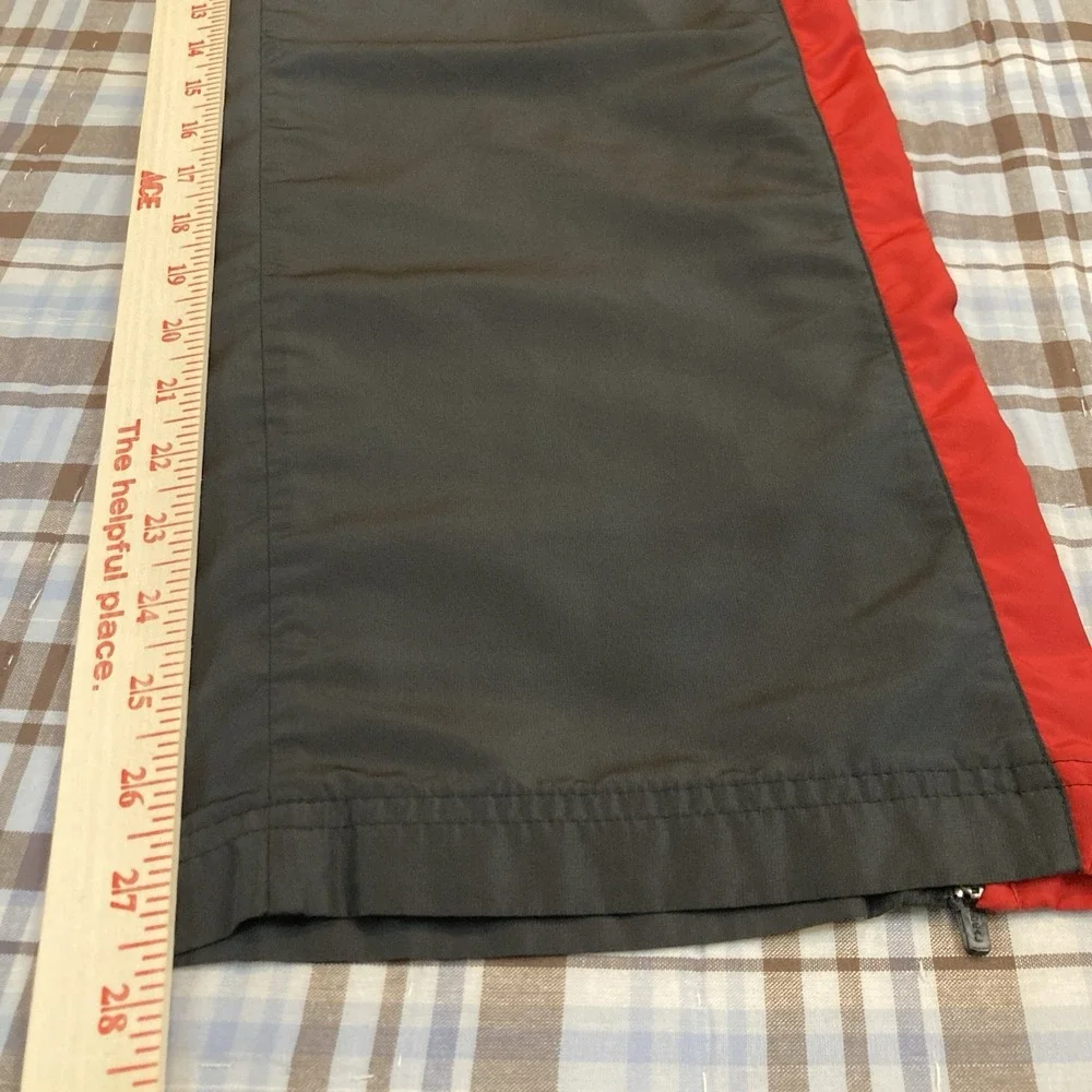Under Armour Pants Men Medium M Windbreaker‎ Red Black Zip Ankles Stretch Track